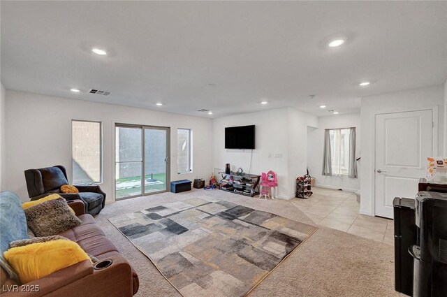 7953 Mountain Lilac St, Las Vegas, NV 89113 - living area featuring recessed lighting, visible vents, light colored carpet, and light tile patterned flooring