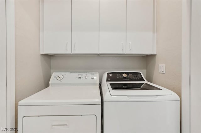 6059 Wheat Penny Ave, Las Vegas, NV 89122 - washroom featuring independent washer and dryer and cabinet space