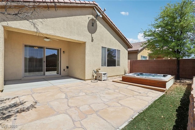 6059 Wheat Penny Ave, Las Vegas, NV 89122 - view of patio / terrace with a ceiling fan, fence, and a hot tub