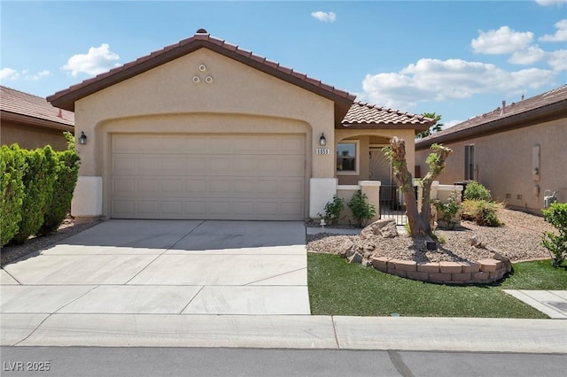 6059 Wheat Penny Ave, Las Vegas, NV 89122 - mediterranean / spanish-style house featuring driveway, stucco siding, a tiled roof, and an attached garage