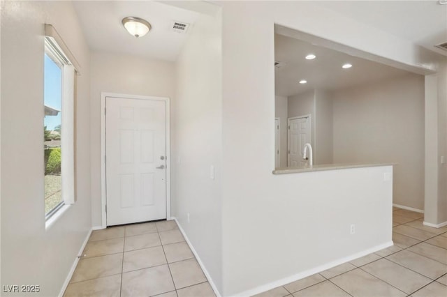 6059 Wheat Penny Ave, Las Vegas, NV 89122 - interior space with light tile patterned flooring, baseboards, visible vents, and recessed lighting