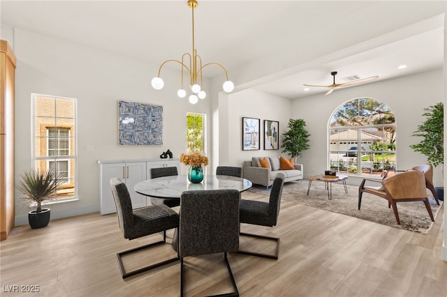 dining room featuring ceiling fan and light wood-type flooring