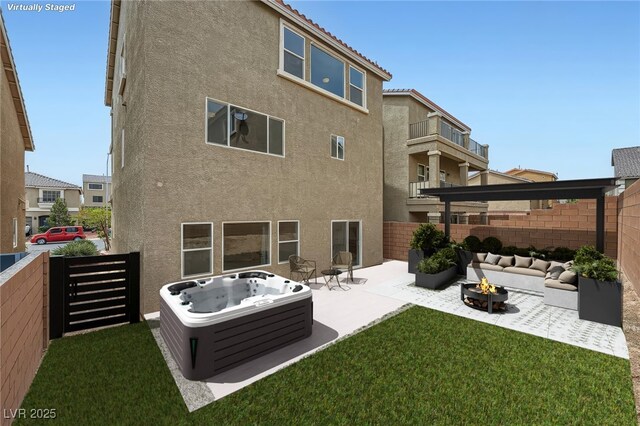 back of property featuring a patio area, stucco siding, and a fenced backyard