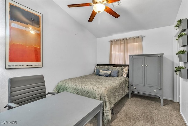 bedroom with ceiling fan, lofted ceiling, carpet flooring, and visible vents