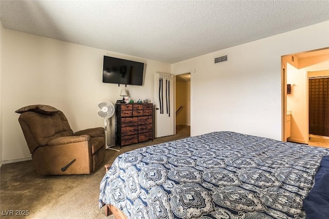 555 Rene Ln, Henderson, NV 89015 - bedroom with visible vents, carpet flooring, and a textured ceiling