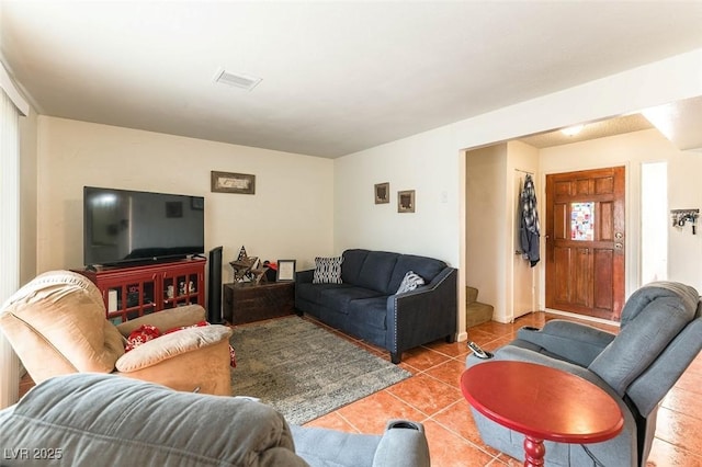 555 Rene Ln, Henderson, NV 89015 - living room featuring light tile patterned flooring and visible vents