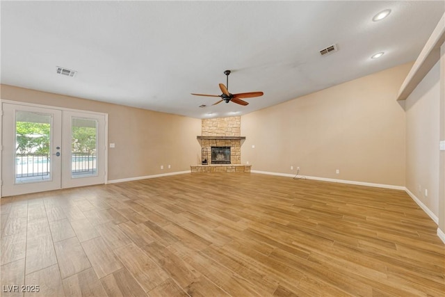 2681 Underbrush Ave, Pahrump, NV 89048 - unfurnished living room with light wood-type flooring, visible vents, and ceiling fan