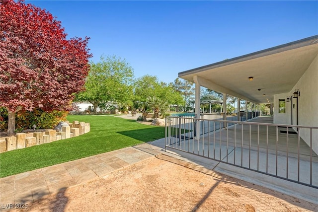 2681 Underbrush Ave, Pahrump, NV 89048 - view of yard featuring a swimming pool and a patio