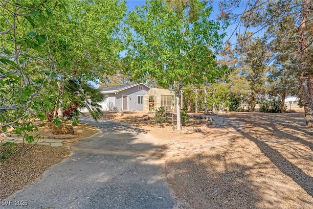 2681 Underbrush Ave, Pahrump, NV 89048 - view of front of house featuring an outdoor structure