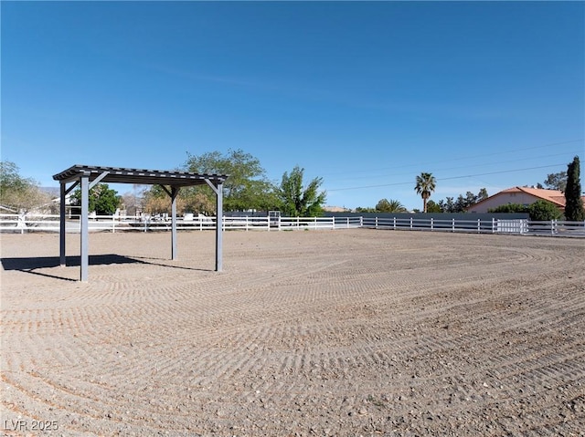 2681 Underbrush Ave, Pahrump, NV 89048 - surrounding community featuring a pergola and an enclosed area