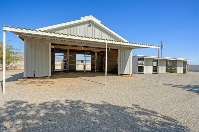 2681 Underbrush Ave, Pahrump, NV 89048 - back of property with an outbuilding and an exterior structure