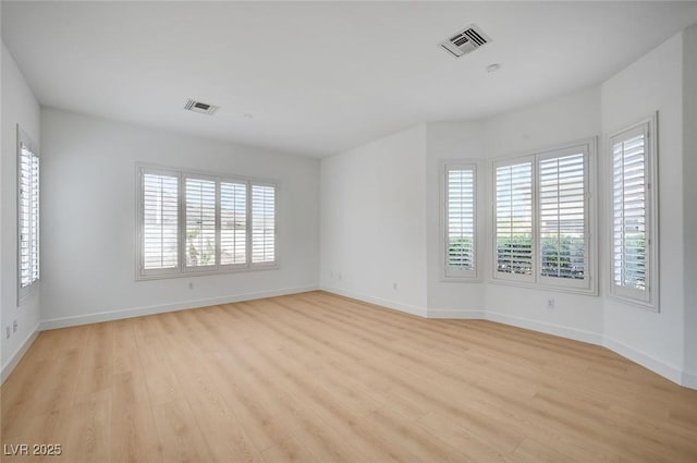 2721 Faiss Dr, Las Vegas, NV 89134 - unfurnished room with light wood-style floors and baseboards