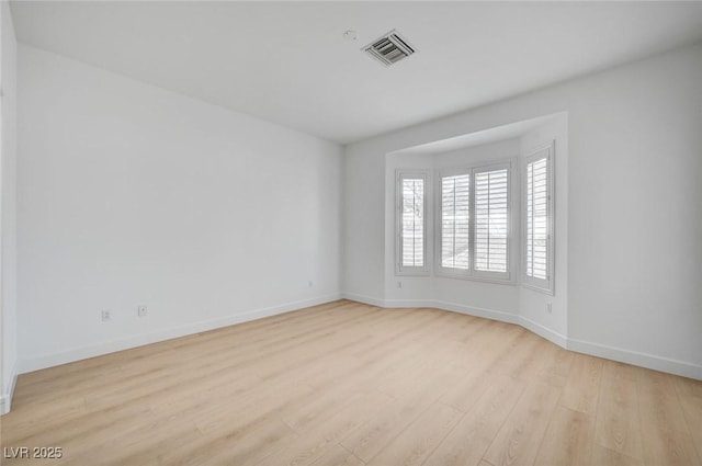 2721 Faiss Dr, Las Vegas, NV 89134 - unfurnished room with light wood-type flooring and baseboards