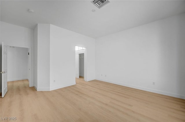 2721 Faiss Dr, Las Vegas, NV 89134 - empty room with light wood-type flooring, baseboards, and a smoke detector