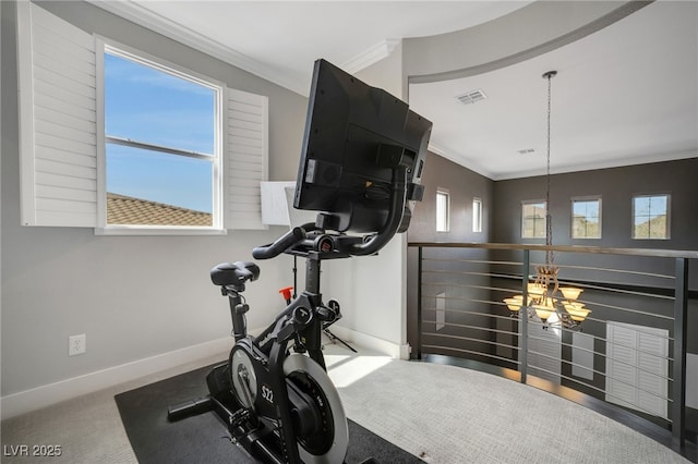 8537 Eureka Heights Ct, Las Vegas, NV 89178 - exercise room with crown molding, baseboards, a chandelier, and carpet