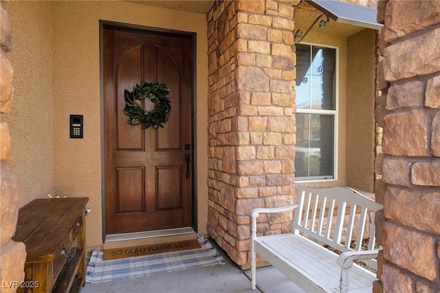 8537 Eureka Heights Ct, Las Vegas, NV 89178 - entrance to property with stucco siding and a porch