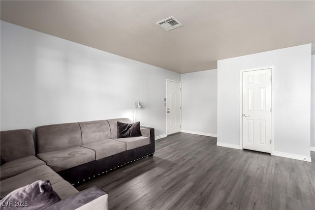 2451 N Rainbow Blvd Unit 1016, Las Vegas, NV 89108 - living room featuring dark wood-style floors and baseboards