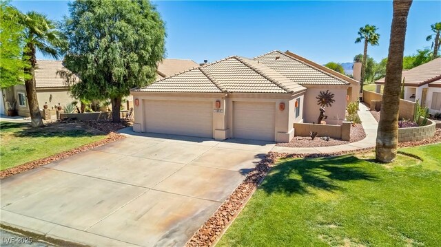 1253 Country Club Dr, Laughlin, NV 89029 - single story home with a front lawn, a garage, stucco siding, a tiled roof, and driveway
