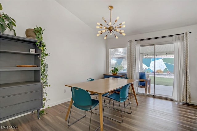 1830 Ginger Blossom Ave, North Las Vegas, NV 89031 - dining space with a chandelier, wood finished floors, and baseboards