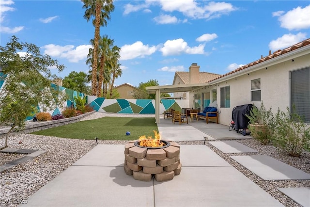 1830 Ginger Blossom Ave, North Las Vegas, NV 89031 - view of patio / terrace featuring an outdoor fire pit and area for grilling
