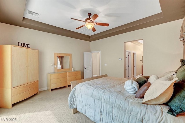 519 Via Garofano Ave, Henderson, NV 89011 - bedroom with a raised ceiling, light carpet, a ceiling fan, and baseboards