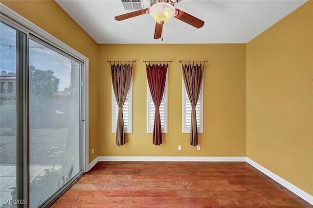 519 Via Garofano Ave, Henderson, NV 89011 - unfurnished room featuring wood finished floors, a ceiling fan, and baseboards