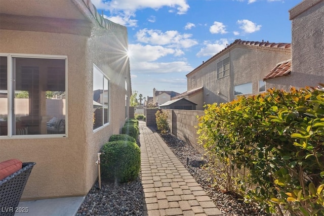 view of home's exterior featuring a fenced backyard and stucco siding