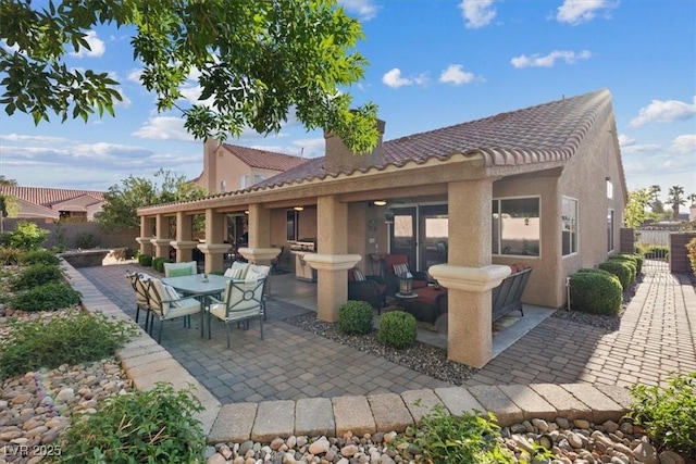 view of patio / terrace with outdoor dining area and fence