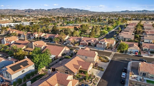 drone / aerial view with a residential view and a mountain view