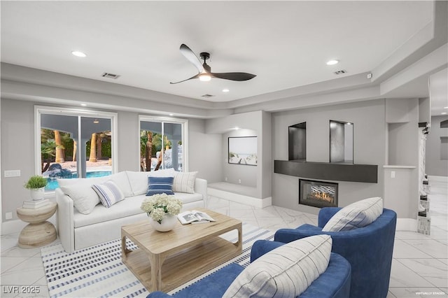 living room featuring recessed lighting, visible vents, marble finish floor, and ceiling fan