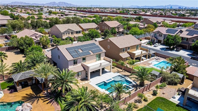 bird's eye view with a residential view and a mountain view