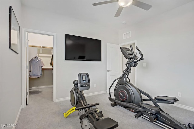 workout area with baseboards, a ceiling fan, carpet flooring, and visible vents
