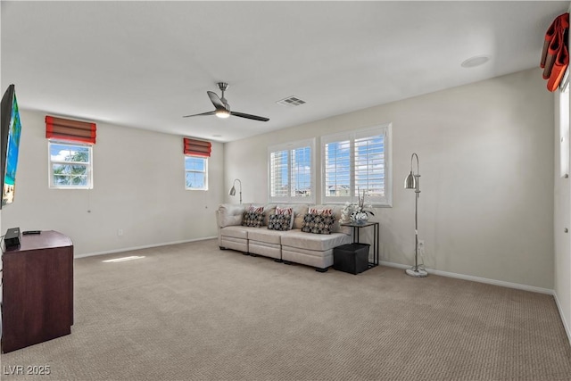 1776 Gentle Brook St, North Las Vegas, NV 89084 - carpeted living area with visible vents, baseboards, and a ceiling fan