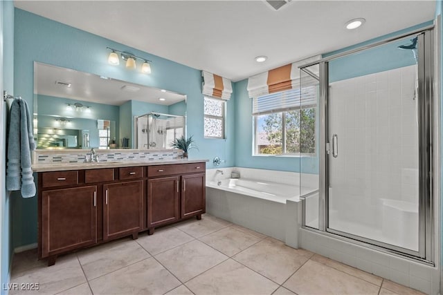 1776 Gentle Brook St, North Las Vegas, NV 89084 - full bath featuring tile patterned flooring, a bath, and a stall shower