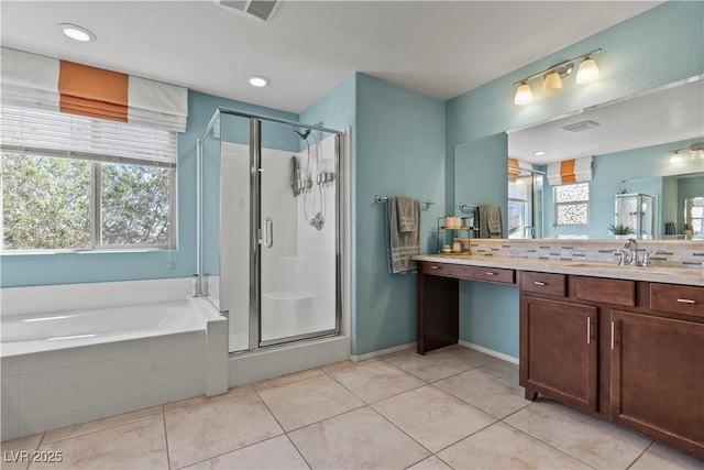 1776 Gentle Brook St, North Las Vegas, NV 89084 - full bathroom with visible vents, a stall shower, tile patterned flooring, and vanity