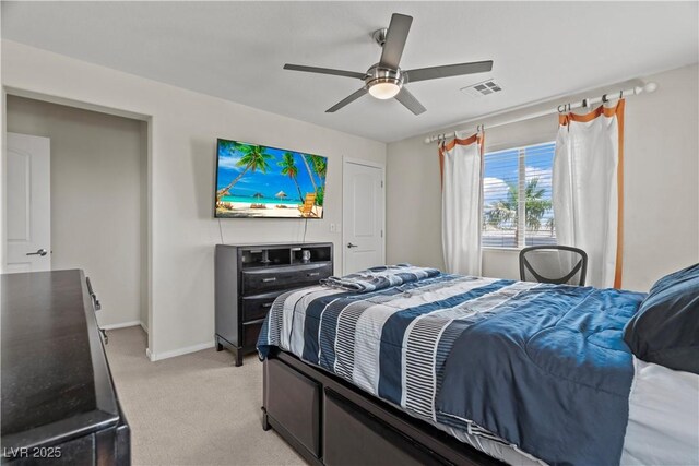 1776 Gentle Brook St, North Las Vegas, NV 89084 - bedroom featuring light carpet, ceiling fan, baseboards, and visible vents