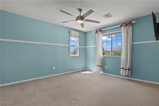 1776 Gentle Brook St, North Las Vegas, NV 89084 - carpeted empty room with baseboards, a ceiling fan, and visible vents