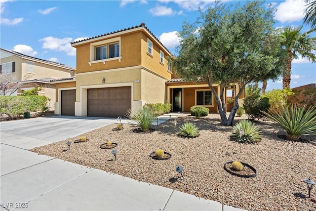 1776 Gentle Brook St, North Las Vegas, NV 89084 - view of front facade with a tiled roof, an attached garage, driveway, and stucco siding