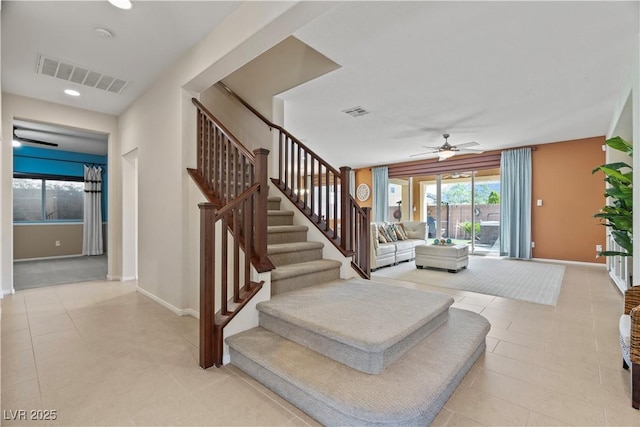 1776 Gentle Brook St, North Las Vegas, NV 89084 - stairs featuring tile patterned flooring, visible vents, baseboards, and ceiling fan