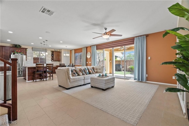 1776 Gentle Brook St, North Las Vegas, NV 89084 - living room with recessed lighting, plenty of natural light, visible vents, and ceiling fan