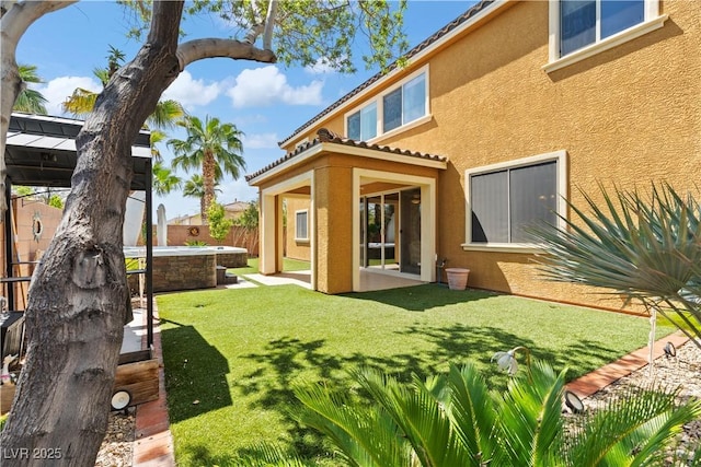 1776 Gentle Brook St, North Las Vegas, NV 89084 - back of property featuring a patio area, a lawn, a fenced backyard, a tile roof, and stucco siding