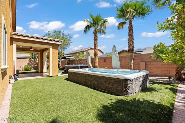 1776 Gentle Brook St, North Las Vegas, NV 89084 - view of yard with a fenced backyard, a patio, and an outdoor hot tub