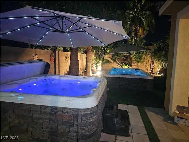 1776 Gentle Brook St, North Las Vegas, NV 89084 - view of patio featuring fence and a hot tub