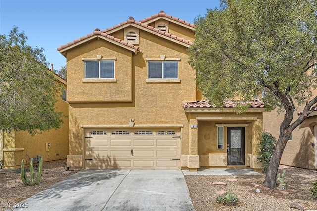 9651 Bouncing Ball St, Las Vegas, NV 89178 - view of front of house featuring a tile roof, an attached garage, concrete driveway, and stucco siding