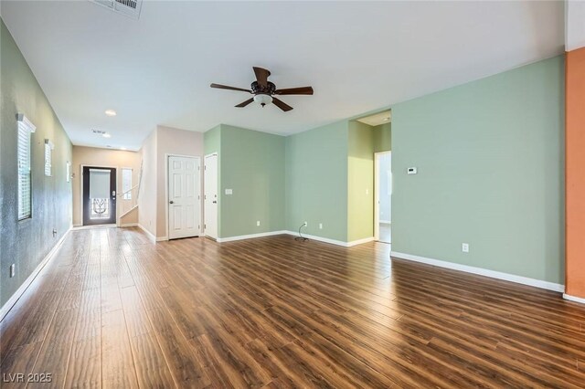 9651 Bouncing Ball St, Las Vegas, NV 89178 - empty room with a ceiling fan, dark wood-type flooring, and baseboards