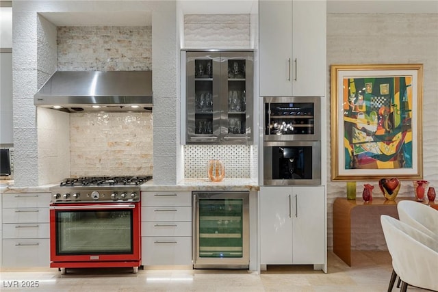 8109 Moonstone Cir, Las Vegas, NV 89128 - kitchen featuring appliances with stainless steel finishes, backsplash, and beverage cooler