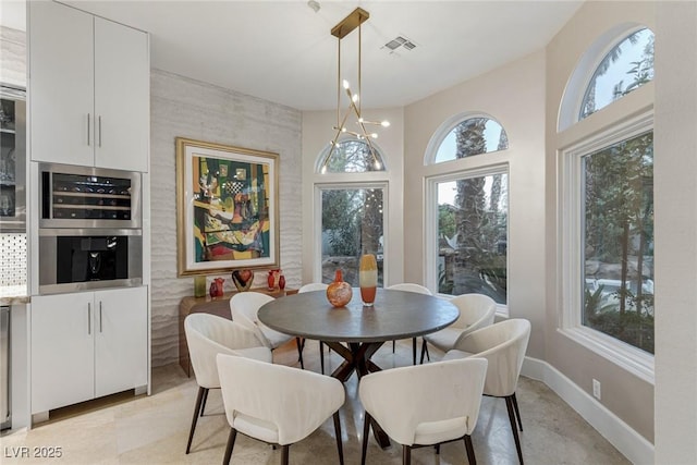8109 Moonstone Cir, Las Vegas, NV 89128 - dining room with visible vents and baseboards
