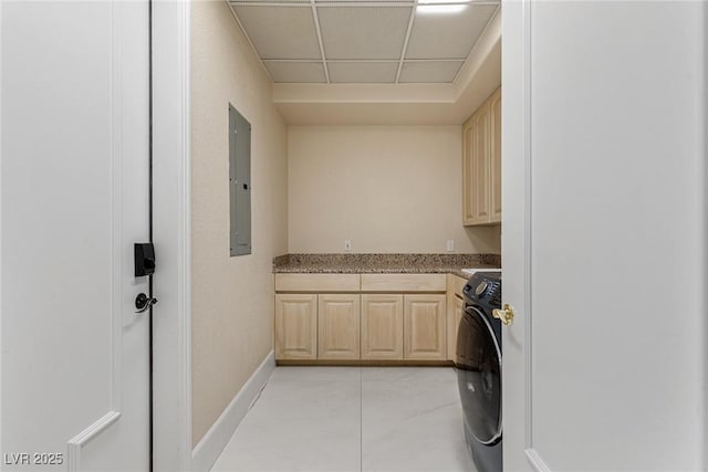 8109 Moonstone Cir, Las Vegas, NV 89128 - laundry area featuring electric panel, cabinet space, light tile patterned floors, baseboards, and washer / dryer