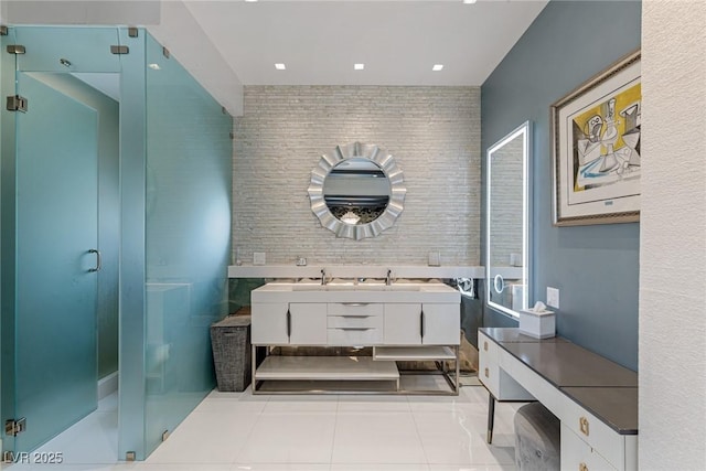 8109 Moonstone Cir, Las Vegas, NV 89128 - full bath featuring a sink, double vanity, tile patterned floors, recessed lighting, and a stall shower