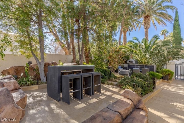 8109 Moonstone Cir, Las Vegas, NV 89128 - view of patio with fence and exterior kitchen